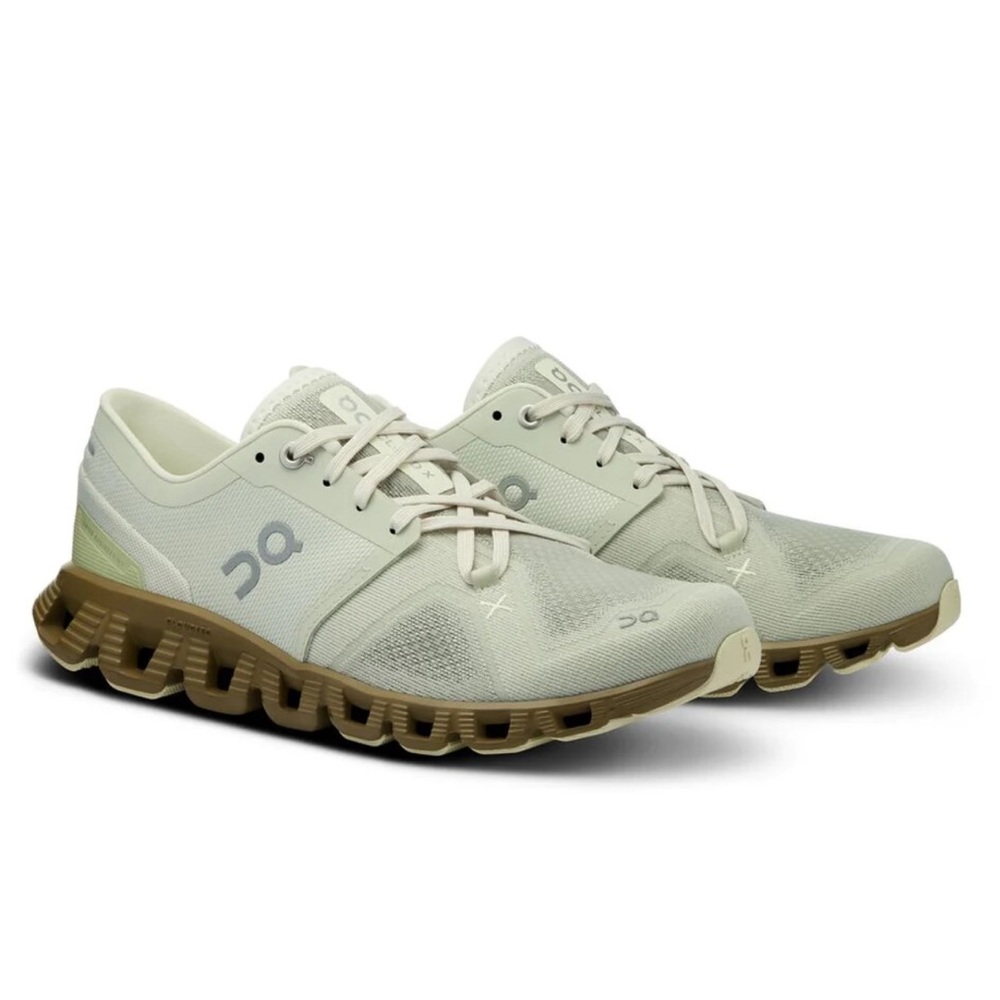 On Running Athletic Shoes in White and Tan and a light green.
I bought this NWOT